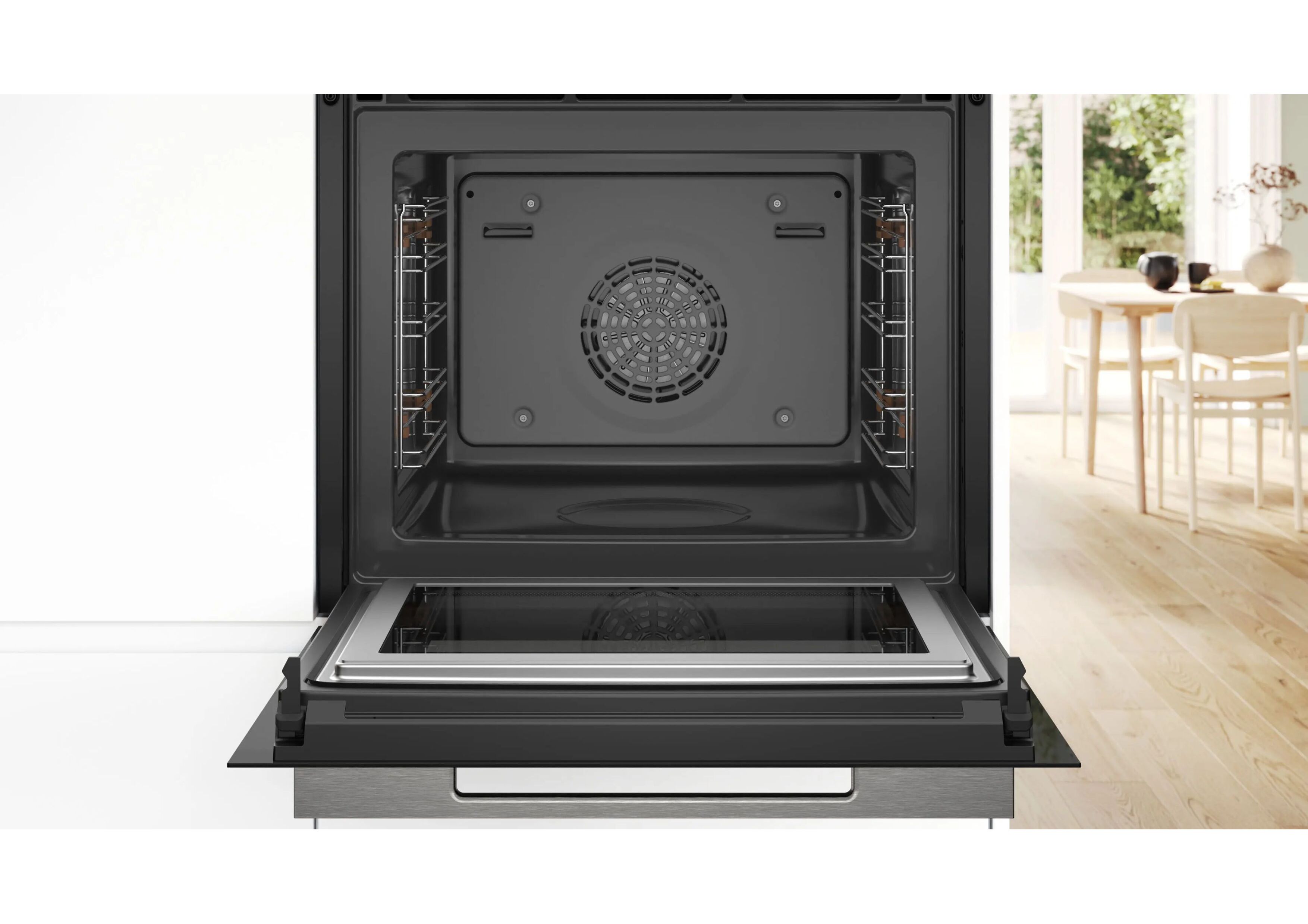 View into the empty, open oven cavity showing the 4D hot air fan