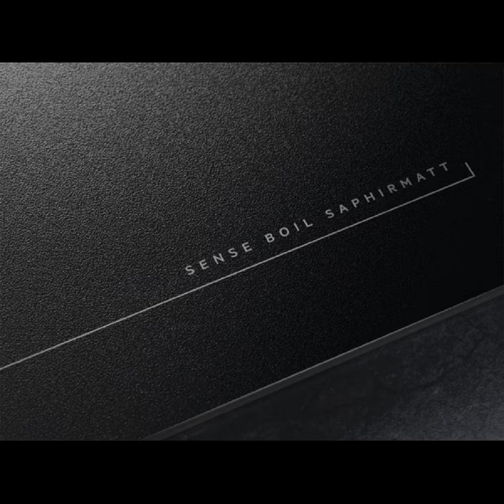 Close-up of the "SenseBoil SaphirMatt" lettering on the finely textured surface