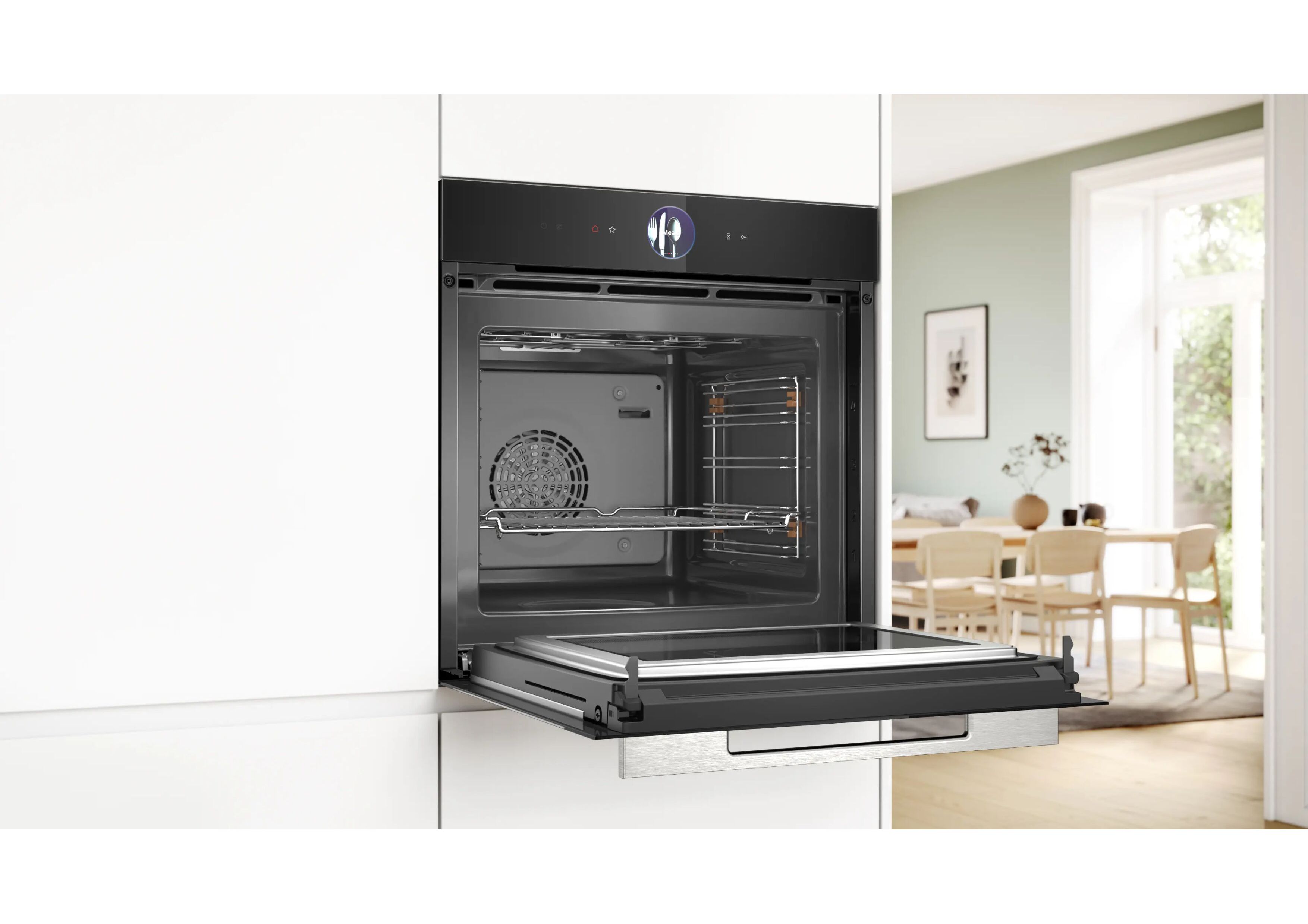 Perspective view of an open Bosch oven integrated into a white kitchen unit.