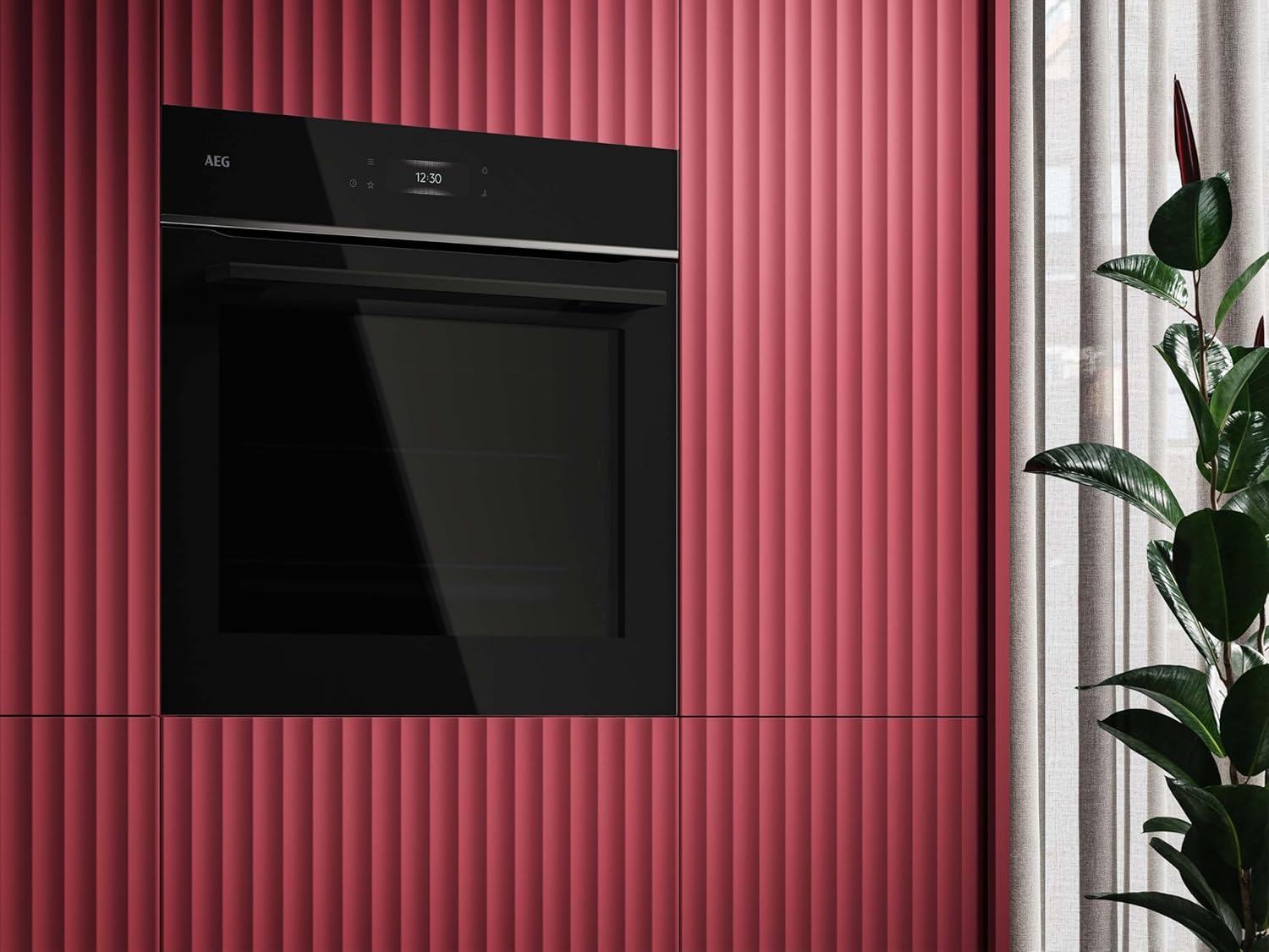 AEG built-in oven in a modern kitchen with red panels and a plant