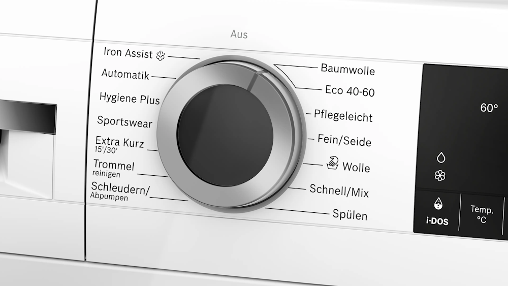 Nahaufnahme des Programmwahlrads der Bosch WGG244F40 mit Iron Assist, Hygiene Plus und Sportswear-Programmen