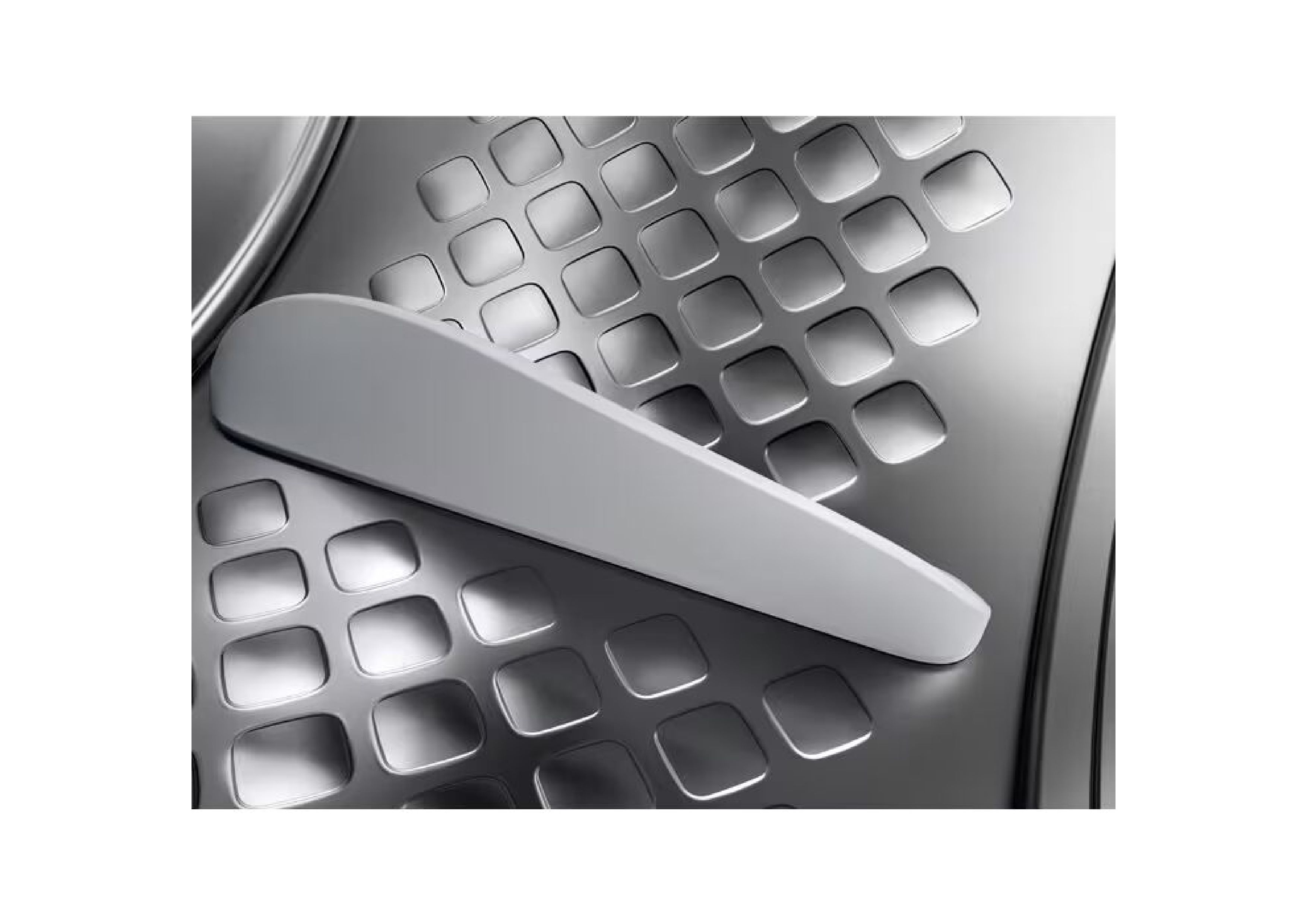 Macro shot of the textured protective drum and a lifter inside the AEG dryer.