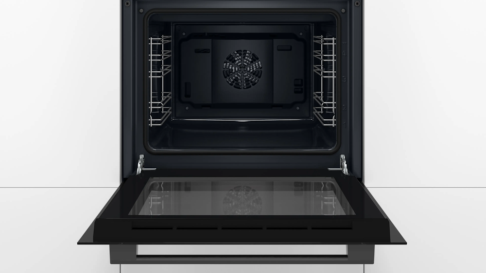 Open Bosch HBF010BA1 oven showing the hot-air fan and enamel interior