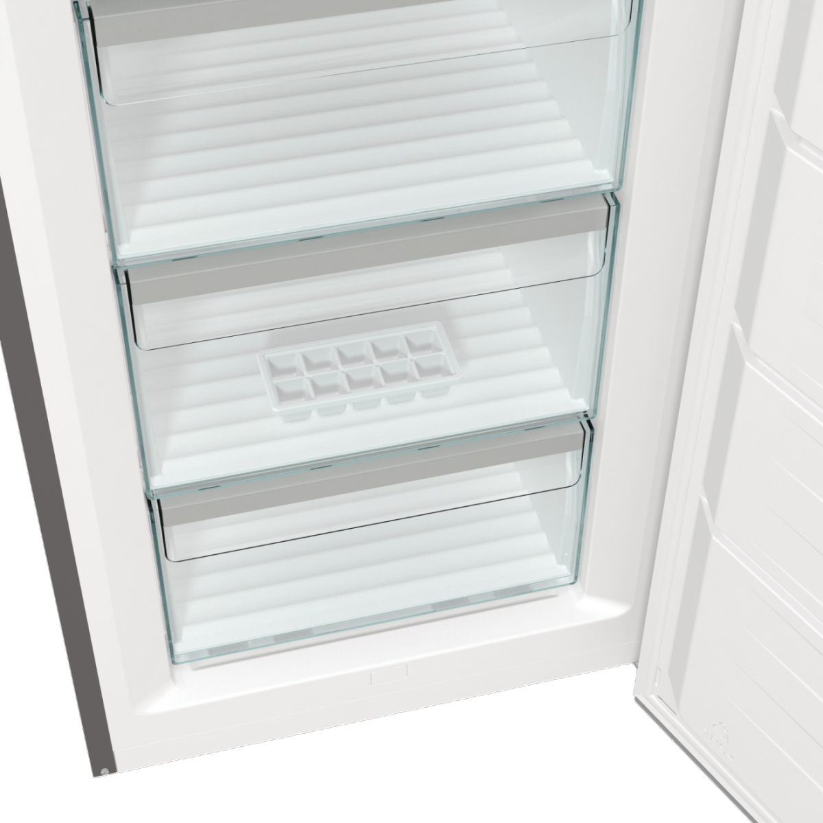 Close-up of the transparent freezer drawers in the interior including an ice cube tray.