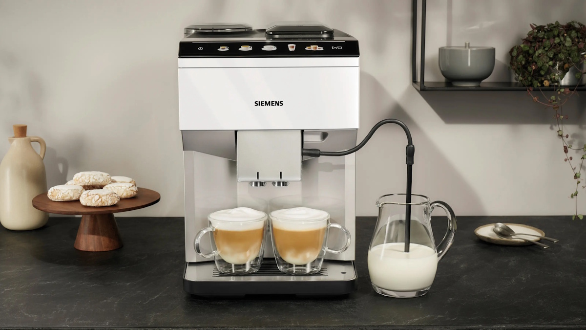 Side view with connected milk tube for cappuccino and latte macchiato.