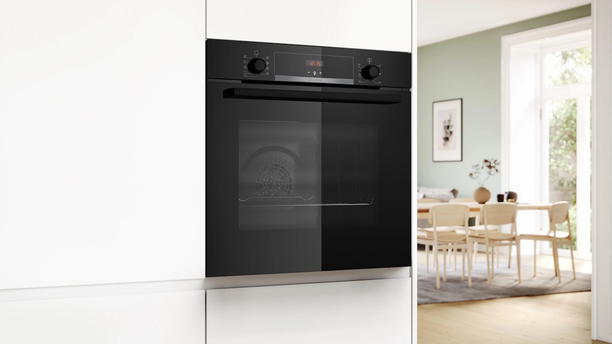 Bosch Series 4 built-in oven black glass design installed in modern kitchen