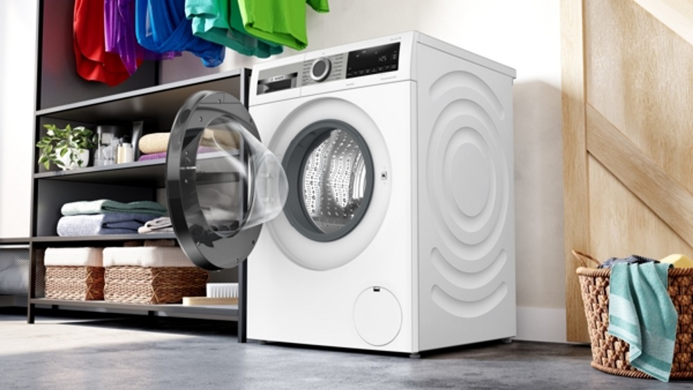 Bosch WGG256Z40 mit geöffneter Trommel in moderner Waschküche