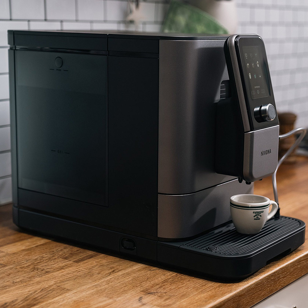 Nivona NIVO 8101 fully automatic coffee machine on a work surface, cup under the spout