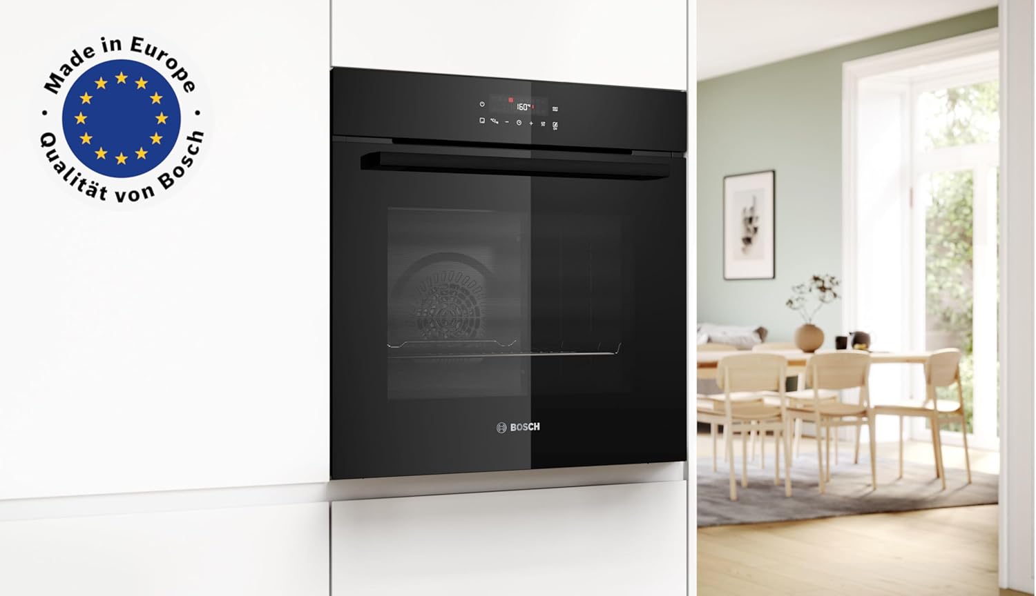 Black Bosch built-in oven in a white high-gloss kitchen with the Made in Europe seal.