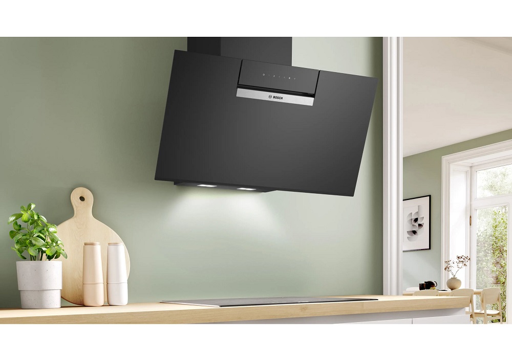 Bosch DWK87FN60 Series 4 wall-mounted cooker hood in black printed clear glass