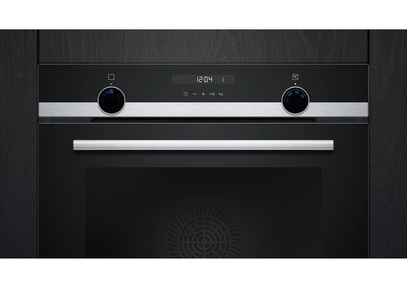 Nahaufnahme des Bedienfelds eines Siemens Backofens mit zwei Drehknebeln, Touch-Tasten und einer Digitaluhr, die 12:04 anzeigt.