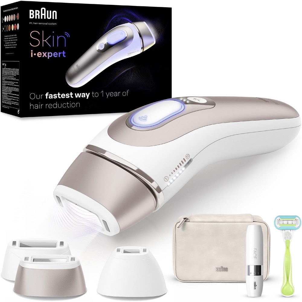 Das Braun Skin i-expert IPL-Set mit Gerät, Aufsätzen, Tasche, Gesichtshaarentferner und Rasierer vor der Box.