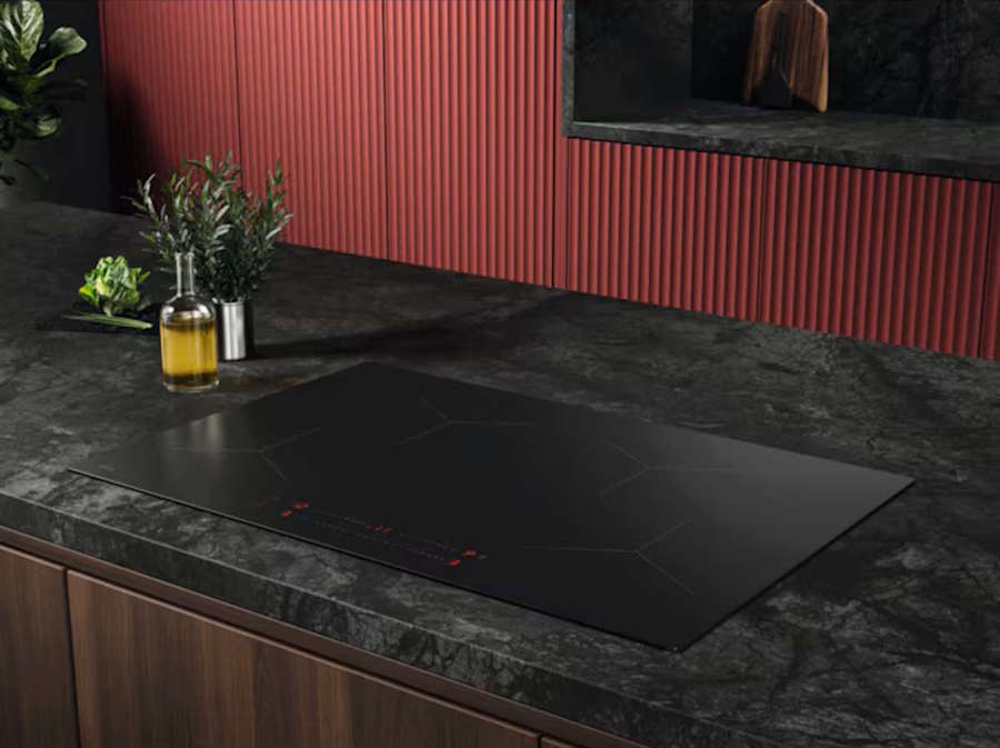 AEG OIO84A00IT induction hob installed in a modern kitchen