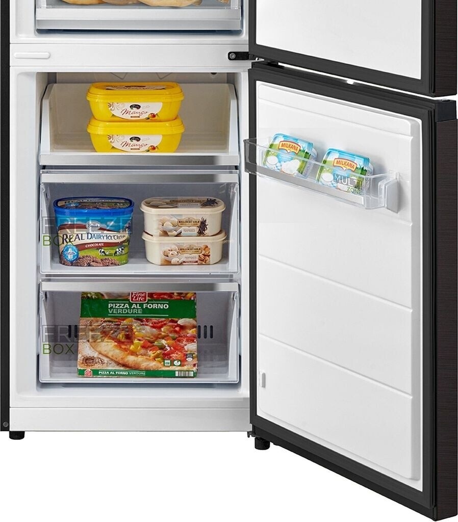 Blick in das geöffnete Gefrierteil der Midea Kombination mit drei transparenten Schubladen.