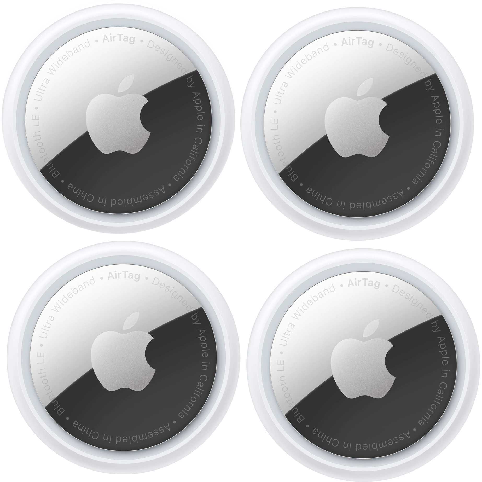 Apple AirTag – Vierer-Set. Vier Apple AirTags nebeneinander auf weißem Hintergrund.