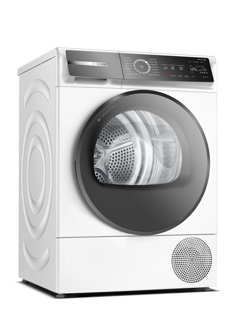 BOSCH WQB245B40 Wärmepumpentrockner Vorderseite Vorderansicht des weißen BOSCH Serie 8 Wärmepumpentrockners WQB245B40 mit 9 kg Fassungsvermögen und geöffneter Tür, die die Edelstahltrommel zeigt.