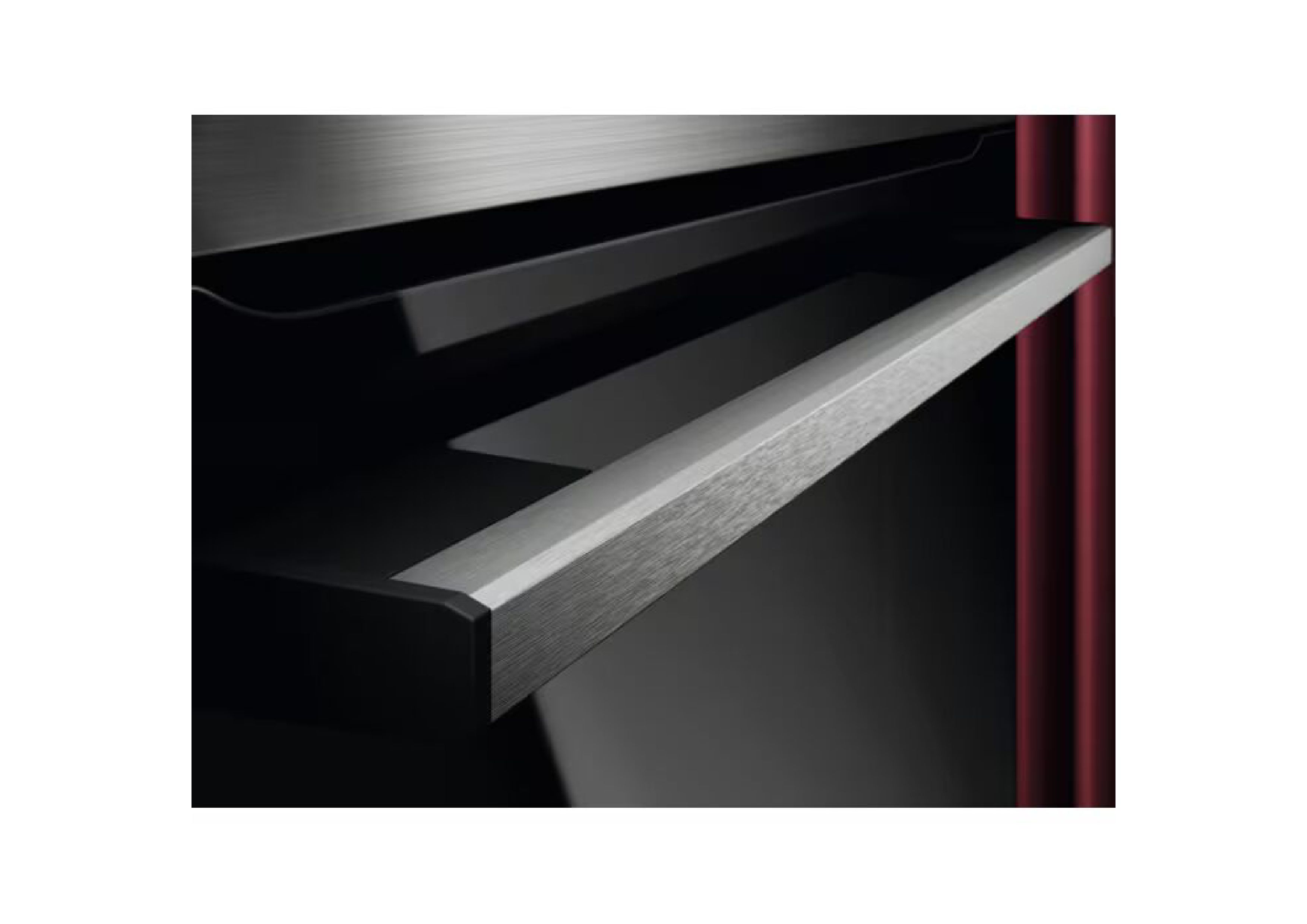 Close-up detail of the brushed stainless steel oven door handle,