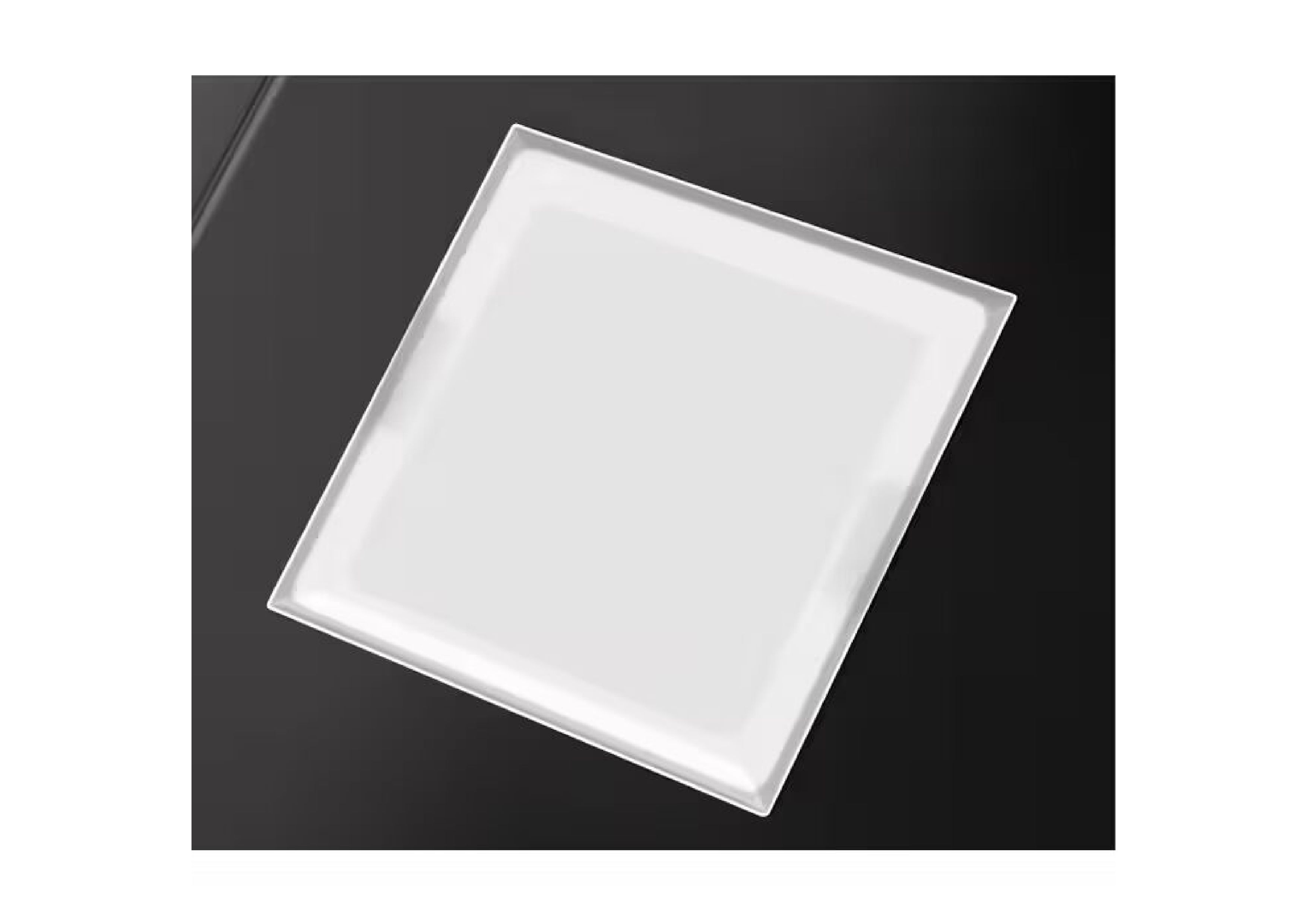 Close-up of the square LED lighting unit on the underside of the extractor hood for optimal hob illumination.