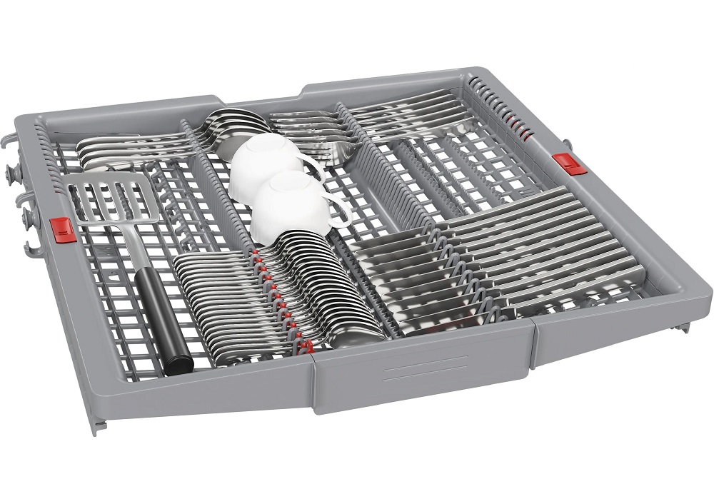 Isolated studio shot of the pull-out VarioDrawer Pro (cutlery tray) of the Bosch dishwasher, neatly loaded with silverware like knives, forks, spoons, cooking utensils, and small coffee cups.