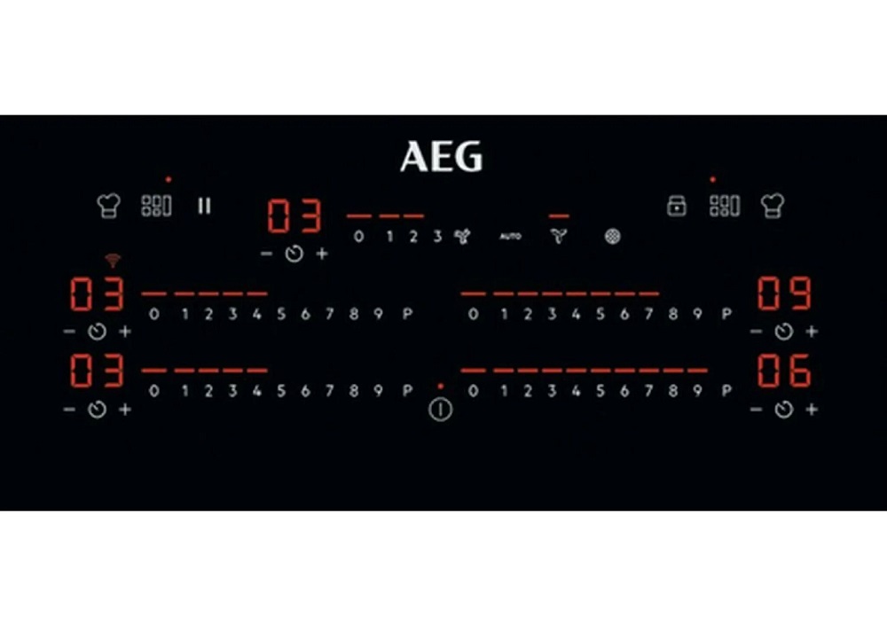 Close-up of the digital touch control interface of the AEG hob with red numerical displays for power levels and timers.