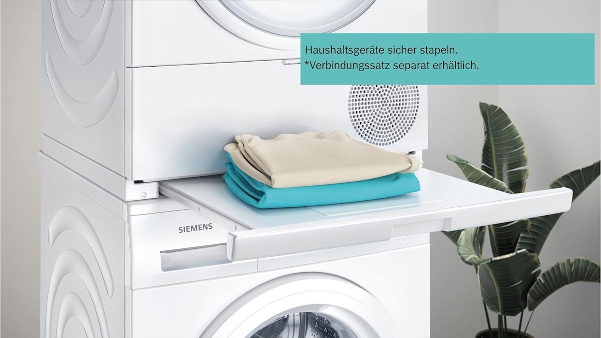 Siemens WQ33G2D40 Wärmepumpentrockner auf Waschmaschine gestapelt, mit Wäschekorb auf Verbindungssatz Siemens WQ33G2D40 Wärmepumpentrockner auf Waschmaschine gestapelt, mit Wäschekorb auf Verbindungssatz.