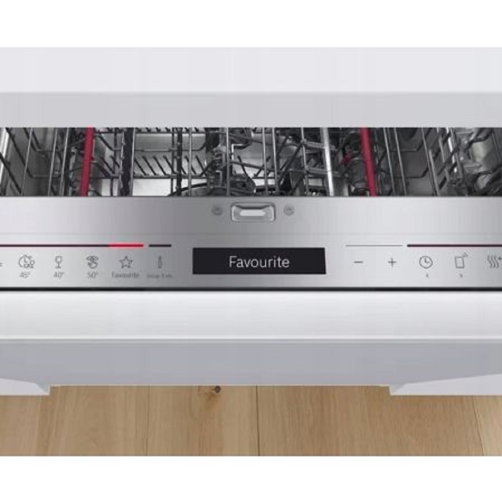 Detailed view of the touch controls focusing on the Favourite button and various wash programs.