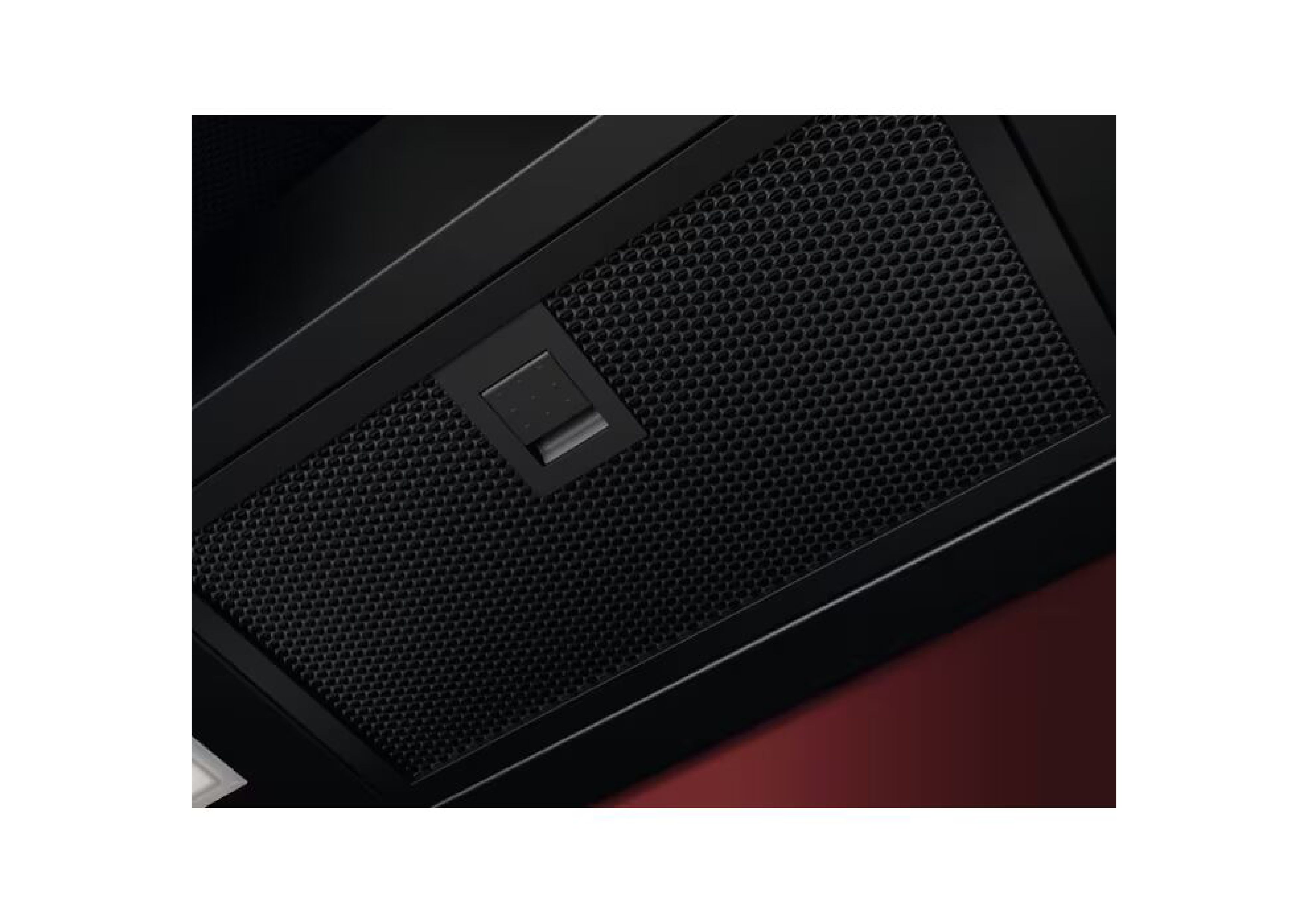 Close-up of the fine-mesh black metal grease filter featuring a practical click-lock for easy removal.