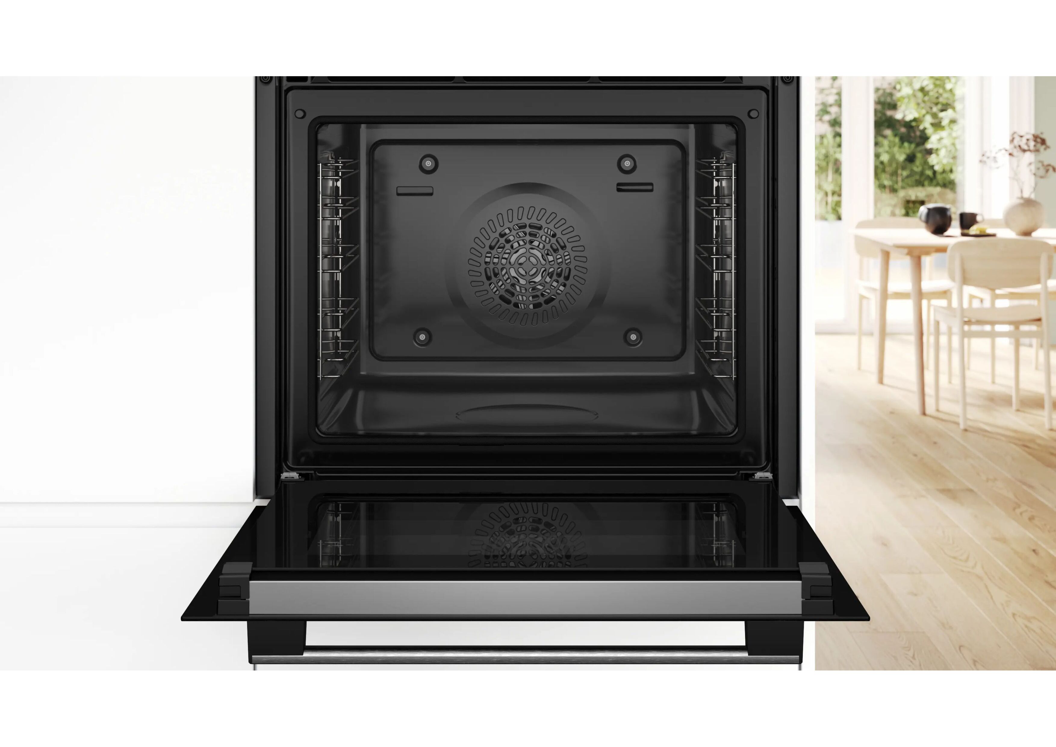 View into the empty oven cavity with the flap door fully open,