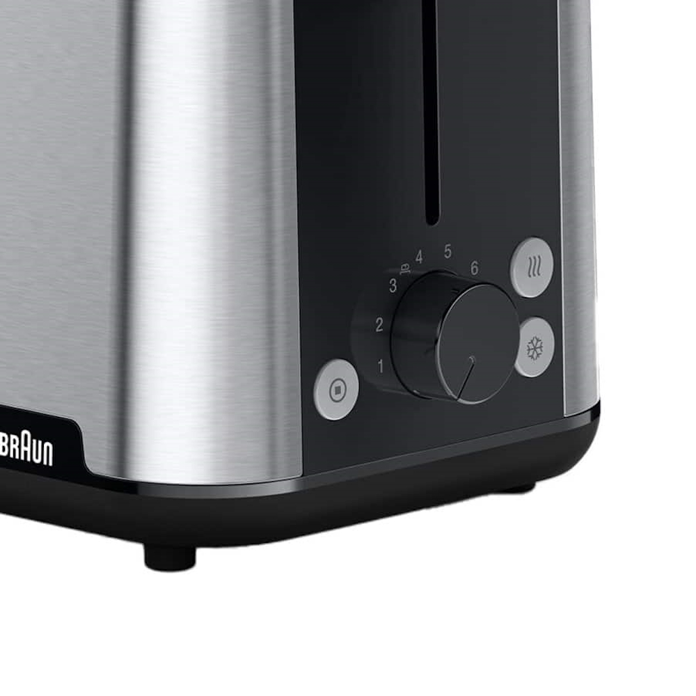 Close-up of the Braun toaster's controls with rotary dial for 8 browning levels, as well as defrost and reheat buttons.