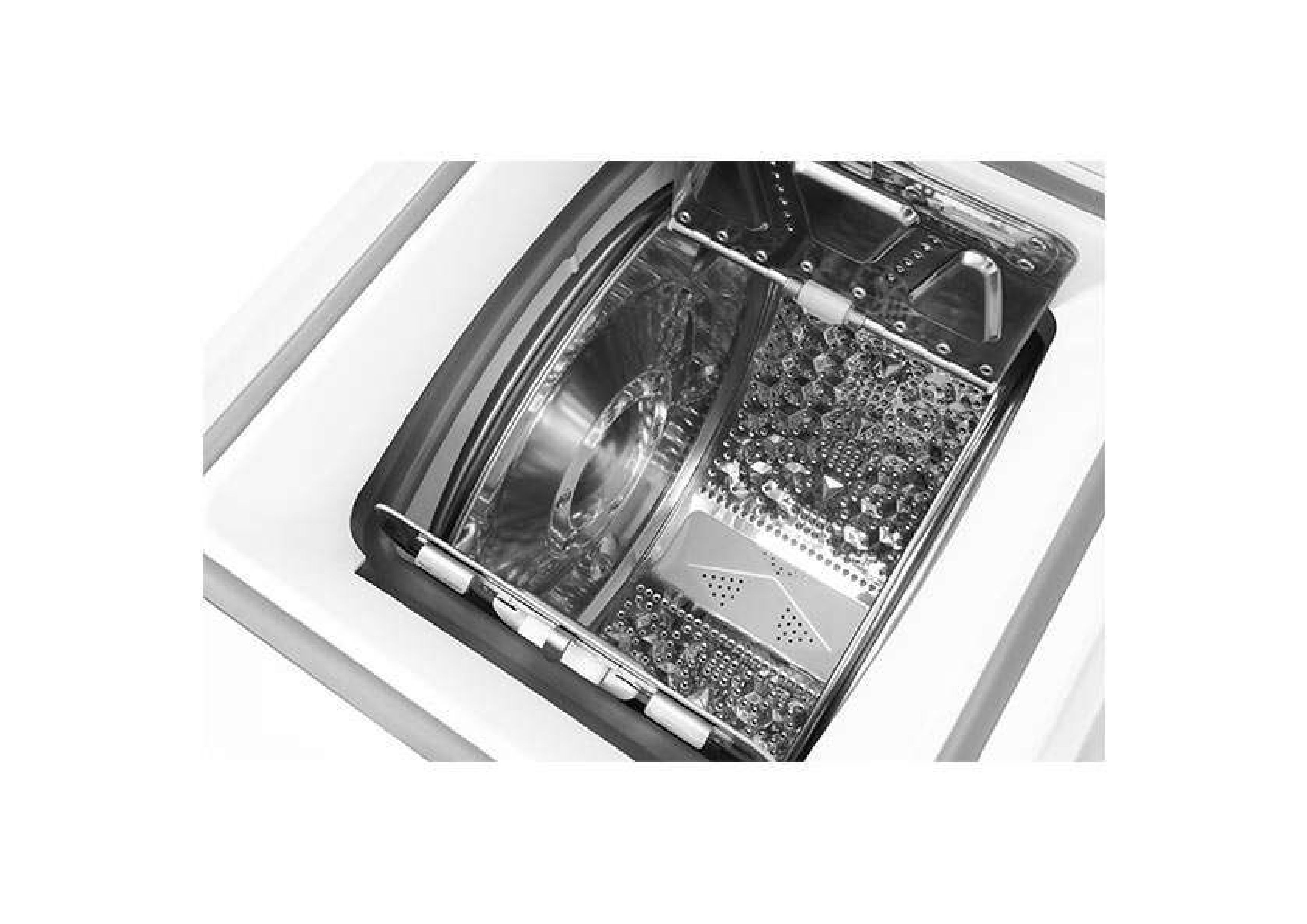 Innenansicht der geöffneten Edelstahltrommel des Topladers mit Blick auf die Lamellen und die Trommelstruktur.