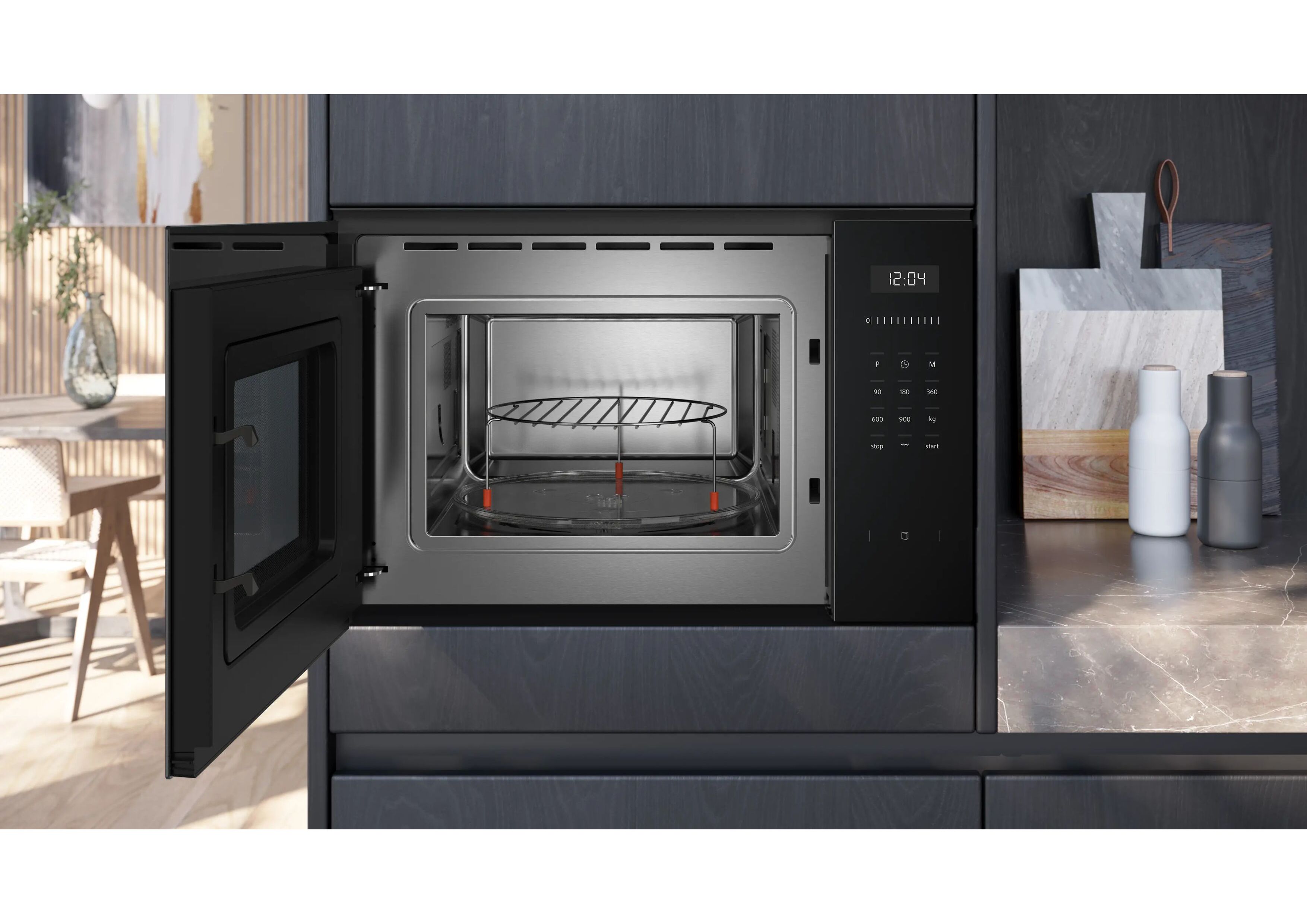 Open Siemens built-in microwave with grill rack on the glass plate.