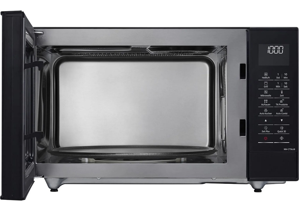 Geöffnete Panasonic NN-CT56 Mikrowelle zeigt den Edelstahl-Garraum und den Glasdrehteller.