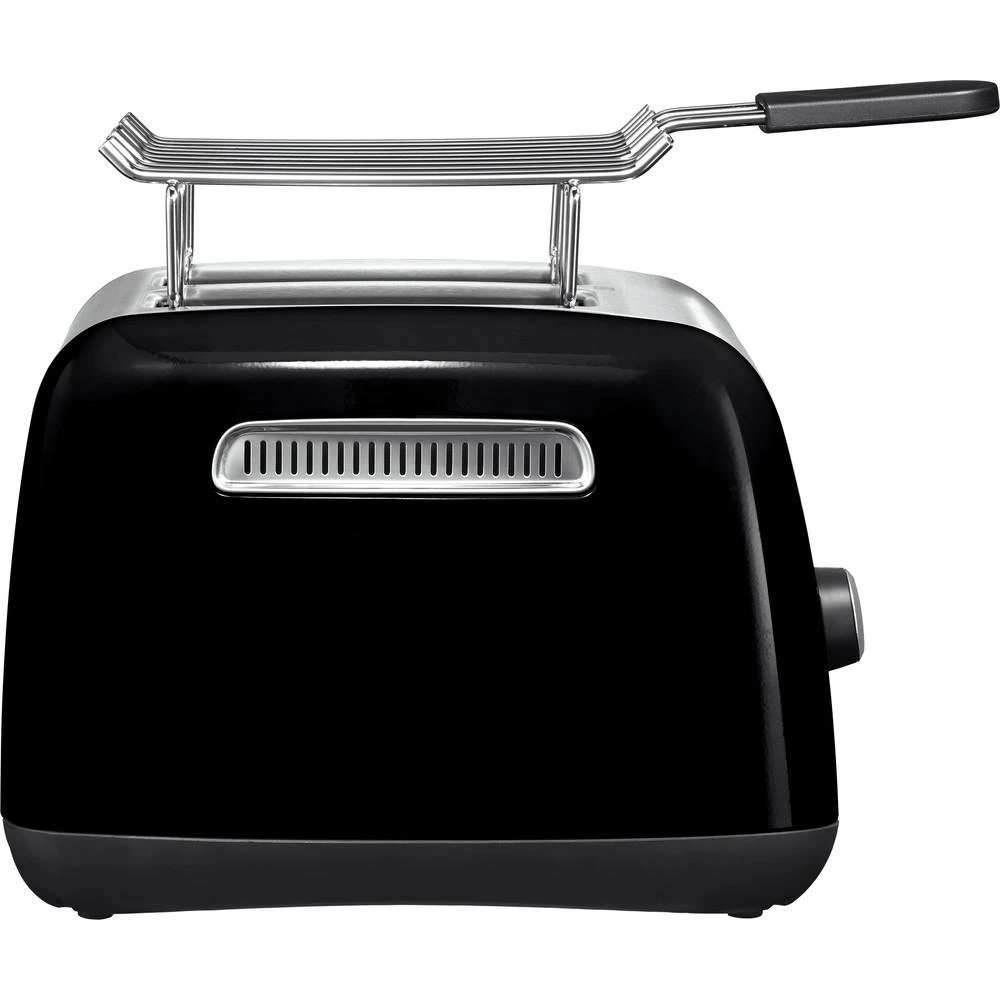Seitliche Ansicht des KitchenAid Toasters 5KMT221EOB mit Brötchenaufsatz, ideal für Brötchen oder Croissants.